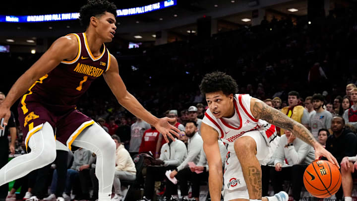Ohio State Buckeyes guard John Mobley Jr. (0) dribbles the ball against Minnesota Golden Gophers guard Isaac Asuma (1) in the first half of the NCAA basketball game at Value City Arena on Tuesday, Jan. 20, 2026 in Columbus, Ohio. Ohio State Buckeyes guard John Mobley Jr. (0) dribbles the ball against Minnesota Golden Gophers guard Isaac Asuma (1) in the first half of the NCAA basketball game at Value City Arena on Tuesday, Jan. 20, 2026 in Columbus, Ohio.