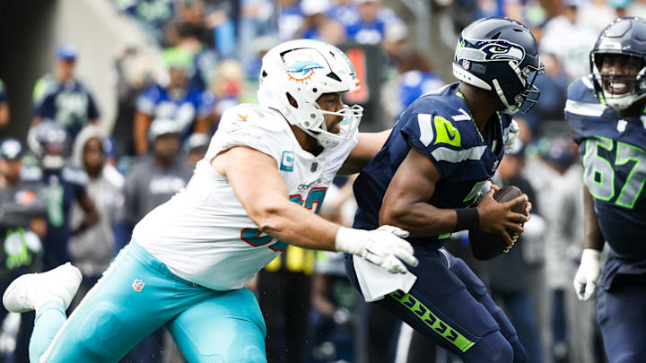 Miami Dolphins defensive tackle Zach Sieler (92) sacks Seattle Seahawks quarterback Geno Smith (7) during the second quarter at Lumen Field. Miami Dolphins defensive tackle Zach Sieler (92) sacks Seattle Seahawks quarterback Geno Smith (7) during the second quarter at Lumen Field.