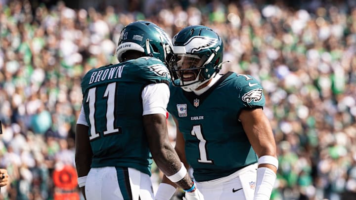 Oct 13, 2024; Philadelphia, Pennsylvania, USA; Philadelphia Eagles quarterback Jalen Hurts (1) and wide receiver A.J. Brown (11) celebrate their touchdown pass during the second quarter against the Cleveland Browns at Lincoln Financial Field. Mandatory Credit: Bill Streicher-Imagn Images Oct 13, 2024; Philadelphia, Pennsylvania, USA; Philadelphia Eagles quarterback Jalen Hurts (1) and wide receiver A.J. Brown (11) celebrate their touchdown pass during the second quarter against the Cleveland Browns at Lincoln Financial Field. Mandatory Credit: Bill Streicher-Imagn Images