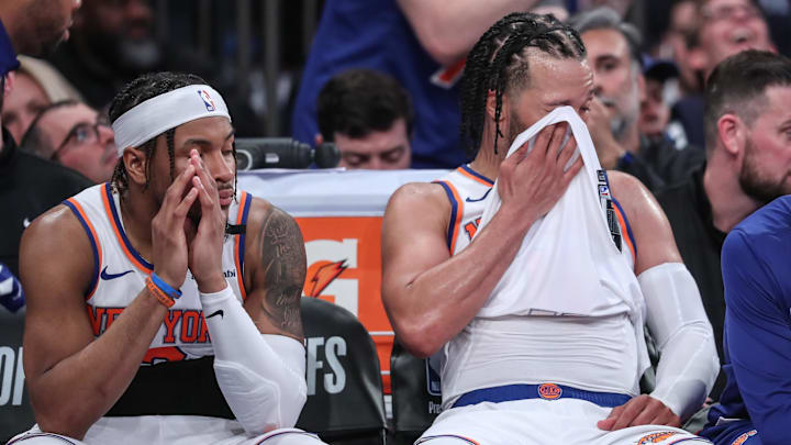 May 10, 2025; New York, New York, USA; New York Knicks guards Miles McBride (2) and Jalen Brunson (11) sit on the bench in the closing minute of the fourth quarter against the Boston Celtics during game three of the second round for the 2025 NBA Playoffs at Madison Square Garden. Mandatory Credit: Wendell Cruz-Imagn Images
