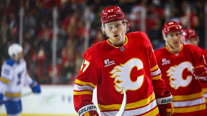 Mar 18, 2026; Calgary, Alberta, CAN; Calgary Flames center Connor Zary (47) celebrates his goal with teammates against the St. Louis Blues during the first period at Scotiabank Saddledome. Mandatory Credit: Sergei Belski-Imagn Images