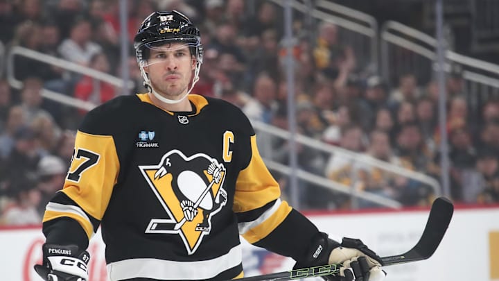 Feb 22, 2025; Pittsburgh, Pennsylvania, USA; Pittsburgh Penguins center Sidney Crosby (87) looks on before a face-off against the Washington Capitals during the first period at PPG Paints Arena. Mandatory Credit: Charles LeClaire-Imagn Images