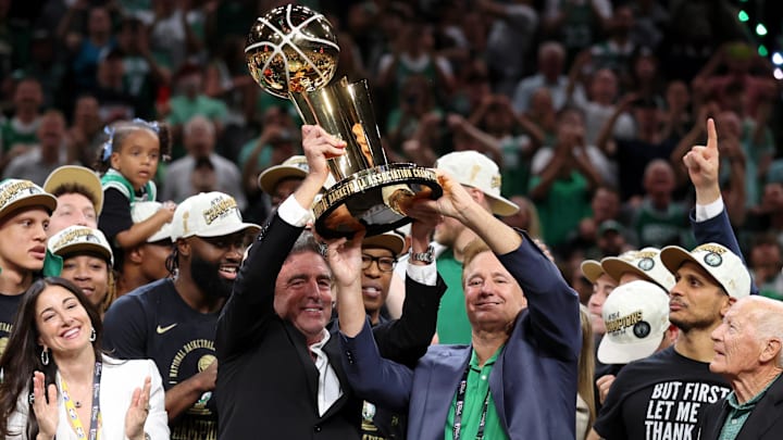 Jun 17, 2024; Boston, Massachusetts, USA; Boston Celtics owner Wyc Grousbeck holds the trophy after winning the 2024 NBA Finals against the Dallas Mavericks at TD Garden. Mandatory Credit: Peter Casey-USA TODAY Sports