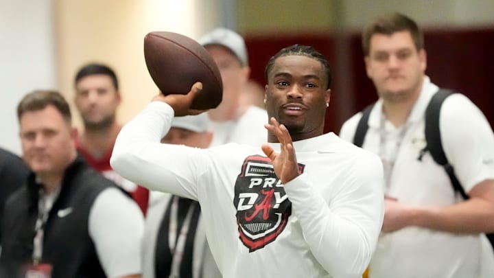 Mar 19, 2025; Tuscaloosa AL, USA; Quarterback Jalen Milroe throws for scouts at the University of Alabama Pro Day as several Crimson Tide players worked out for NFL teams in the Hank Crisp Indoor Practice Facility. Mar 19, 2025; Tuscaloosa AL, USA; Quarterback Jalen Milroe throws for scouts at the University of Alabama Pro Day as several Crimson Tide players worked out for NFL teams in the Hank Crisp Indoor Practice Facility.