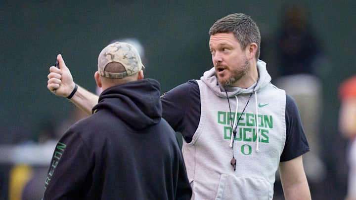 Oregon head coach Dan Lanning walks the field as the Oregon Ducks practice on Jan. 5, 2025, at the Moshofsky Center in Eugene, Oregon, ahead of the Peach Bowl.