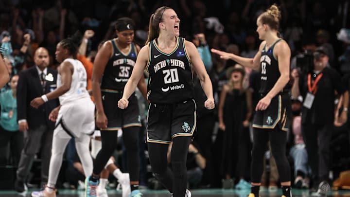 Oct 1, 2024; Brooklyn, New York, USA; New York Liberty guard Sabrina Ionescu (20) celebrates after defeating the Las Vegas Aces 88-84 in game two of the 2024 WNBA Semi-finals at Barclays Center. Mandatory Credit: Wendell Cruz-Imagn Images
