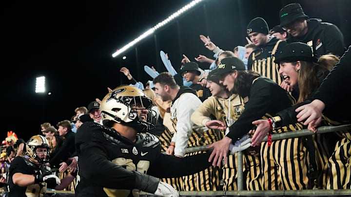 Purdue Boilermakers defensive lineman Isaiah Nichols (93) celebrates with fans 