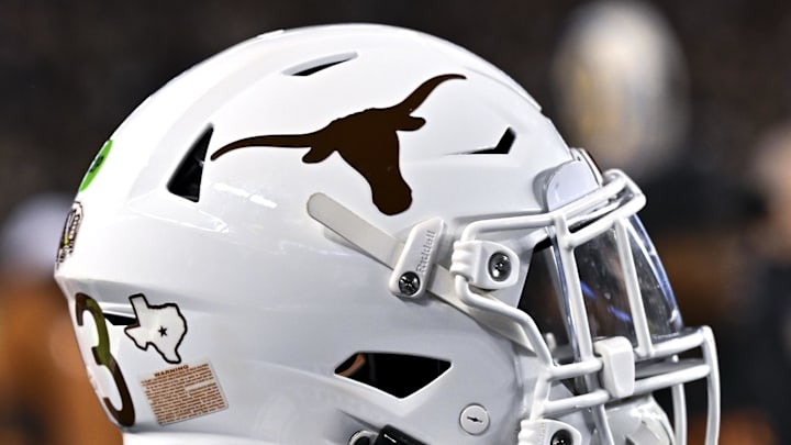 Nov 30, 2024; College Station, Texas, USA; A detail view of a Texas Longhorns helmet on the sideline during the first quarter against the Texas A&M Aggies. The Longhorns defeated the Aggies 17-7 at Kyle Field. Mandatory Credit: Maria Lysaker-Imagn Images Nov 30, 2024; College Station, Texas, USA; A detail view of a Texas Longhorns helmet on the sideline during the first quarter against the Texas A&M Aggies. The Longhorns defeated the Aggies 17-7 at Kyle Field. Mandatory Credit: Maria Lysaker-Imagn Images