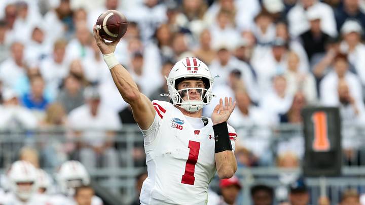 Sep 26, 2026; University Park, Pennsylvania, USA;  Wisconsin Badgers quarterback Colton Joseph (1) throws a pass during the first quarter against the Penn State Nittany Lions at West Shore Home Field at Beaver Stadium.  Mandatory Credit: Matthew O'Haren-Imagn Images