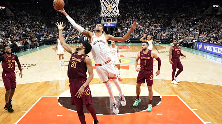 San Antonio Spurs forward Victor Wembanyama (1) shoots over Cleveland Cavaliers center Jarrett Allen (31) during the second half at Frost Bank Center. Mandatory Credit: Scott Wachter-Imagn Images