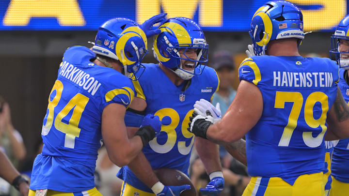 Nov 2, 2025; Inglewood, California, USA; Los Angeles Rams tight end Tyler Higbee (89) celebrates his touchdown catch with tight end Colby Parkinson (84) and offensive tackle Rob Havenstein (79) during the first half against the New Orleans Saints at SoFi Stadium. Mandatory Credit: Jayne Kamin-Oncea-Imagn Images