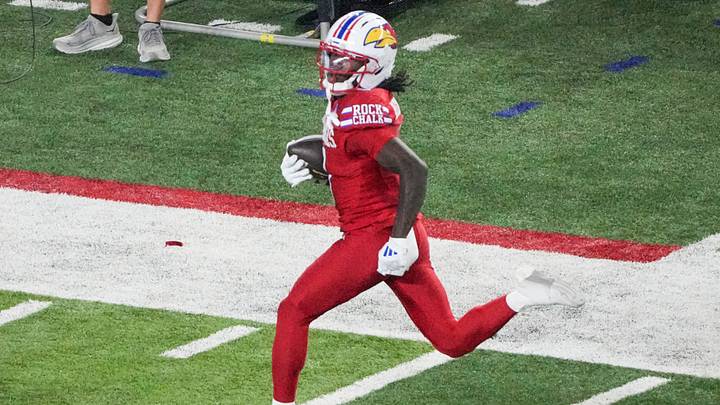 Sep 11, 2026; Lawrence, Kansas, USA; Kansas Jayhawks cornerback Austin Alexander (0) runs for a touchdown against the Missouri Tigers during the first half of the game at David Booth Kansas Memorial Stadium. Mandatory Credit: Denny Medley-Imagn Images Sep 11, 2026; Lawrence, Kansas, USA; Kansas Jayhawks cornerback Austin Alexander (0) runs for a touchdown against the Missouri Tigers during the first half of the game at David Booth Kansas Memorial Stadium. Mandatory Credit: Denny Medley-Imagn Images