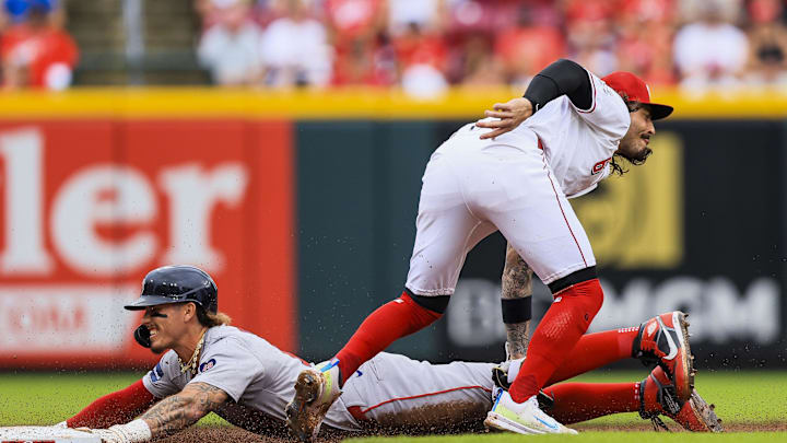 Jun 23, 2024; Cincinnati, Ohio, USA; Boston Red Sox outfielder Jarren Duran (16) steals second against Cincinnati Reds second baseman Jonathan India (6) in the third inning at Great American Ball Park. Mandatory Credit: Katie Stratman-USA TODAY Sports