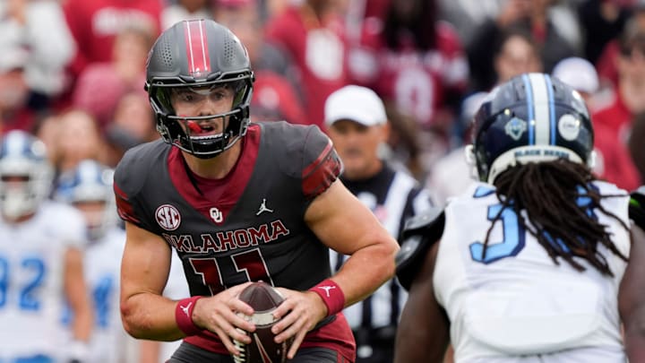 Oklahoma Sooners quarterback Jackson Arnold (11) scrambles before pitching the ball during a college football game between the University of Oklahoma Sooners (OU) and the Maine Black Bears at Gaylord Family - Oklahoma Memorial Stadium in Norman, Okla., Saturday, Nov. 2, 2024.