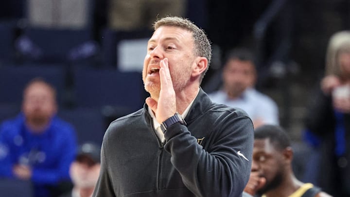 Dec 17, 2025; Memphis, Tennessee, USA; Vanderbilt Commodores head coach Mark Byington calls a play against the Memphis Tigers during the first half at FedExForum. Mandatory Credit: Wesley Hale-Imagn Images