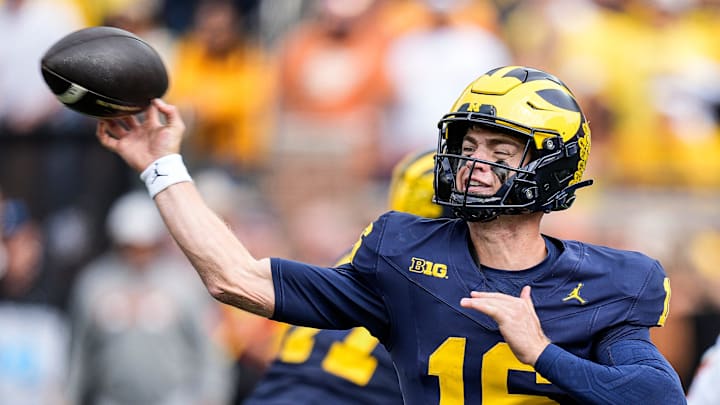 Michigan quarterback Davis Warren (16) makes a pass against Texas during the second half at Michigan Stadium in Ann Arbor on Saturday, September 7, 2024.