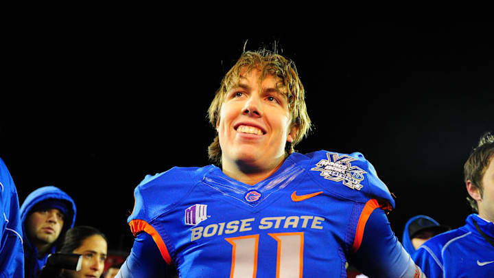 Dec. 22, 2011; Las Vegas, NV, USA; Boise State Broncos quarterback Kellen Moore following the game against the Arizona State Sun Devils during the 2011 Las Vegas Bowl at Sam Boyd Stadium. Boise State defeated Arizona State 56-24. Mandatory Credit: Mark J. Rebilas-Imagn Images