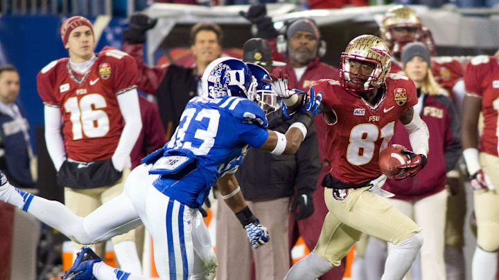 Dec 7, 2013; Charlotte, NC, USA; Florida State Seminoles wide receiver Kenny Shaw (81) runs after making a catch during the third quarter against the Duke Blue Devils at Bank of America Stadium. FSU defeated Duke 45-7. Mandatory Credit: Jeremy Brevard-Imagn Images