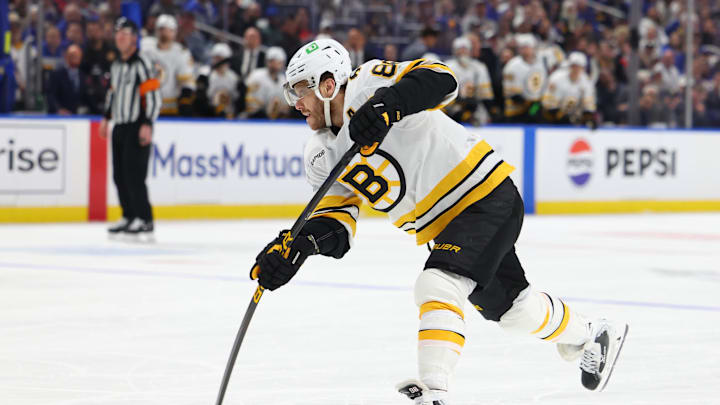 Apr 28, 2026; Buffalo, New York, USA; Boston Bruins right wing David Pastrnak (88) takes a shot on goal during the first period against the Buffalo Sabres in game five of the first round of the 2026 Stanley Cup Playoffs at KeyBank Center. Mandatory Credit: Timothy T. Ludwig-Imagn Images