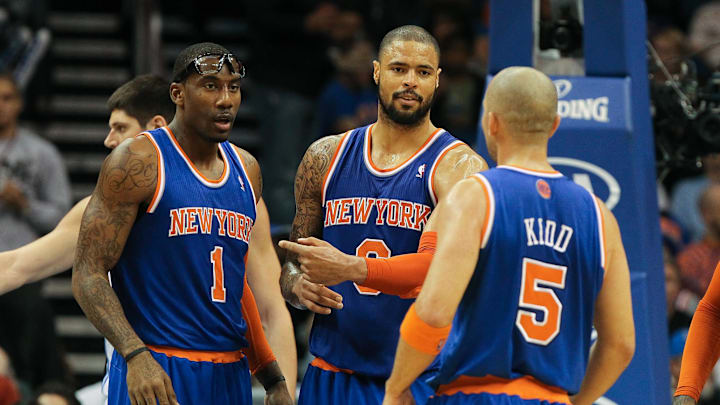 January 5, 2013; Orlando FL, USA; New York Knicks power forward Amar'e Stoudemire (1), center Tyson Chandler (6) and point guard Jason Kidd (5) talks against the Orlando Magic during the second half at Amway Center. New York Knicks defeated the Orlando Magic 114-106. Mandatory Credit: Kim Klement-Imagn Images