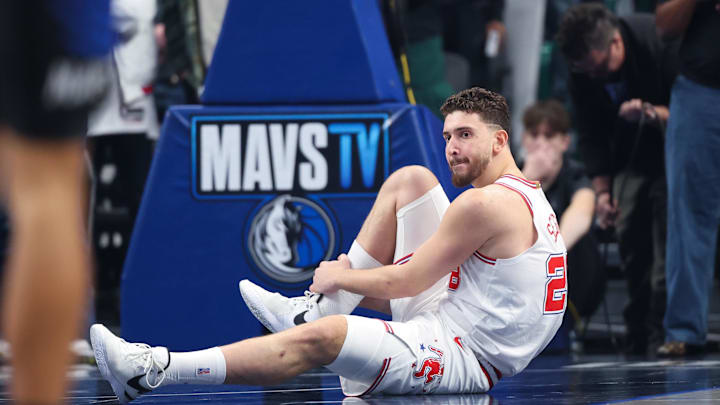 Jan 3, 2026; Dallas, Texas, USA;  Houston Rockets center Alperen Sengun (28) lays injured during the first quarter against the Dallas Mavericks at American Airlines Center. Mandatory Credit: Kevin Jairaj-Imagn Images
