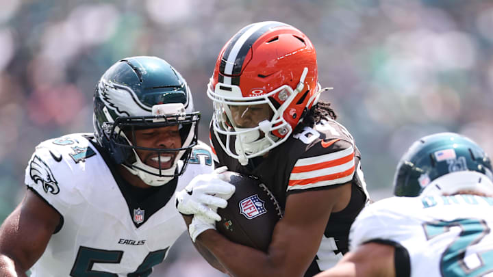 Aug 16, 2025; Philadelphia, Pennsylvania, USA; Cleveland Browns wide receiver Gage Larvadain (84) runs with the ball against Philadelphia Eagles linebacker Jeremiah Trotter Jr. (54) and safety Sydney Brown (21) during the first quarter at Lincoln Financial Field. Mandatory Credit: Bill Streicher-Imagn Images
