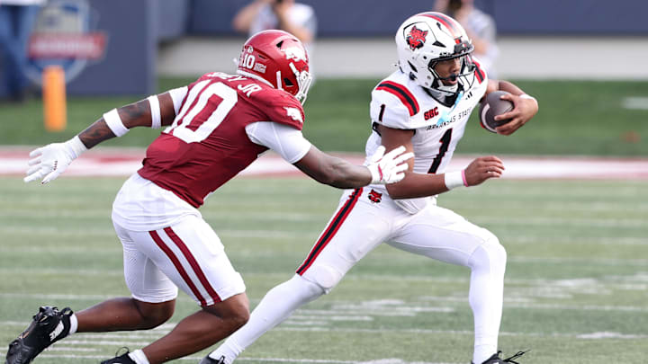 Sep 6, 2025; Little Rock, Arkansas, USA; Arkansas State Red Wolves quarterback Jaylen Raynor (1) rushes during the first quarter against the Arkansas Razorbacks at War Memorial Stadium. Mandatory Credit: Nelson Chenault-Imagn Images