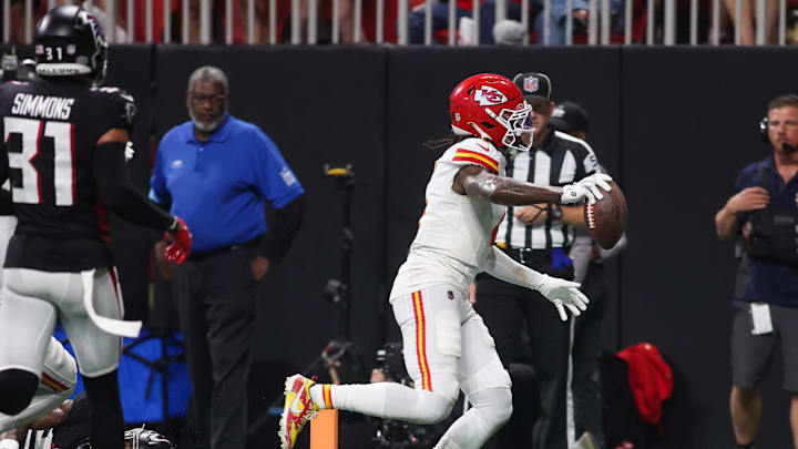 Sep 22, 2024; Atlanta, Georgia, USA; Kansas City Chiefs wide receiver Rashee Rice (4) scores a touchdown against the Atlanta Falcons in the second quarter at Mercedes-Benz Stadium. Mandatory Credit: Brett Davis-Imagn Images