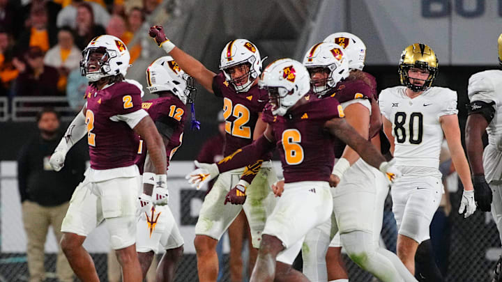 ASU defensive back Xavion Alford (2) celebrates a fourth down stop with his teammates against UCF during a game at Mountain America Stadium in Tempe on Nov. 9, 2024. ASU defensive back Xavion Alford (2) celebrates a fourth down stop with his teammates against UCF during a game at Mountain America Stadium in Tempe on Nov. 9, 2024.