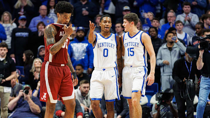 Feb 24, 2024; Lexington, Kentucky, USA; Kentucky Wildcats guard Rob Dillingham (0) talks with guard