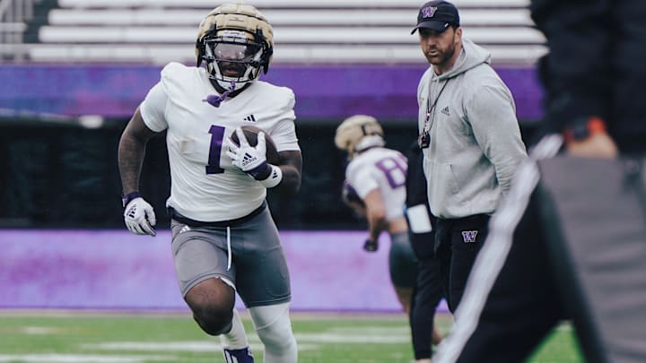 Jonah Coleman shows off his compact size at UW practice. Jonah Coleman shows off his compact size at UW practice.