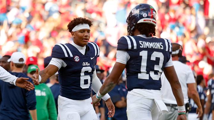 Mississippi Rebels quarterback Trinidad Chambliss reacts with quarterback Austin Simmons. Mandatory Credit: Petre Thomas-Imagn Images Mississippi Rebels quarterback Trinidad Chambliss reacts with quarterback Austin Simmons. Mandatory Credit: Petre Thomas-Imagn Images