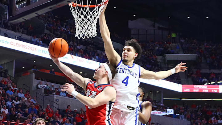 Feb 4, 2025; Oxford, Mississippi, USA; Mississippi Rebels guard Sean Pedulla (3) shoots as Kentucky Wildcats guard Koby Brea (4) defends during the second half at The Sandy and John Black Pavilion at Ole Miss. Mandatory Credit: Petre Thomas-Imagn Images