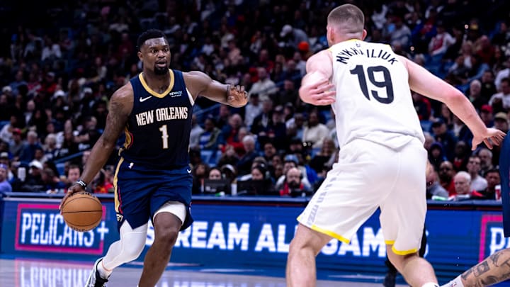 Jan 17, 2025; New Orleans, Louisiana, USA; New Orleans Pelicans forward Zion Williamson (1) drives to the basket against Utah Jazz guard Svi Mykhailiuk (19) during the first half at Smoothie King Center. Mandatory Credit: Stephen Lew-Imagn Images Jan 17, 2025; New Orleans, Louisiana, USA; New Orleans Pelicans forward Zion Williamson (1) drives to the basket against Utah Jazz guard Svi Mykhailiuk (19) during the first half at Smoothie King Center. Mandatory Credit: Stephen Lew-Imagn Images