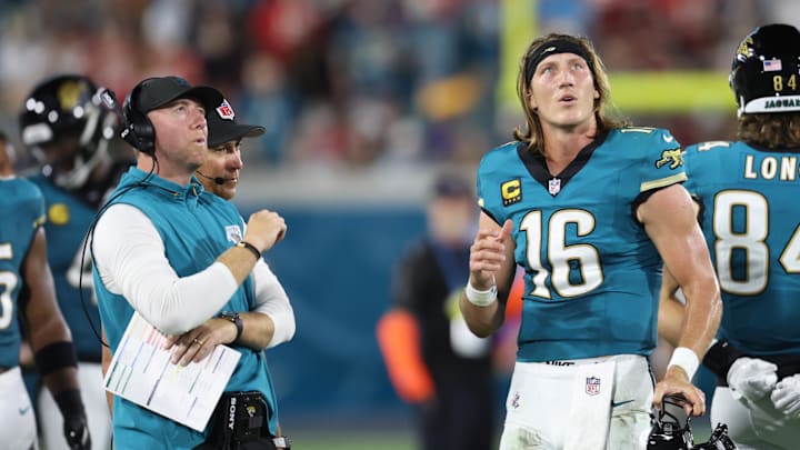 Oct 6, 2025; Jacksonville, Florida, USA; Jacksonville Jaguars head coach Liam Coen and quarterback Trevor Lawrence (16) during the first half against the Kansas City Chiefs at EverBank Stadium. Mandatory Credit: Morgan Tencza-Imagn Images