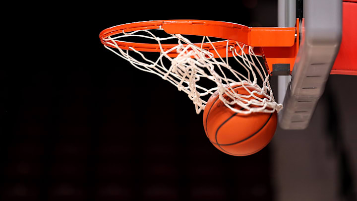 Jan 11, 2023; College Station, Texas, USA; A detail shot of a basketball going through the hoop prior to the game between the Texas A&M Aggies and the Missouri Tigers at Reed Arena. Mandatory Credit: Erik Williams-Imagn Images