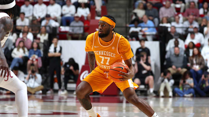 Jan 24, 2026; Tuscaloosa, Alabama, USA; Tennessee Volunteers guard Amaree Abram (77) dribbles the ball during the first half against the Alabama Crimson Tide at Coleman Coliseum. Mandatory Credit: David Leong-Imagn Images