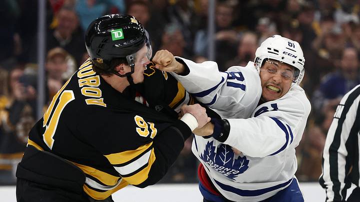 Mar 24, 2026; Boston, Massachusetts, USA; Toronto Maple Leafs center Dakota Joshua (81) fights with Boston Bruins defenseman Nikita Zadorov (91) during the third period at TD Garden. Mandatory Credit: Winslow Townson-Imagn Images