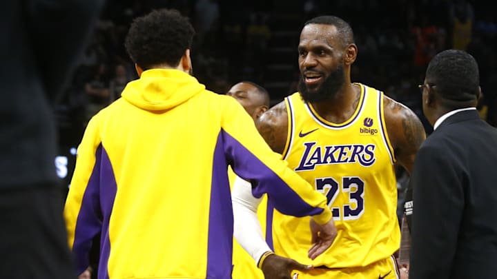 Apr 12, 2024; Memphis, Tennessee, USA; Los Angeles Lakers forward LeBron James (23) reacts after a dunk during the second half against the Memphis Grizzlies at FedExForum. Mandatory Credit: Petre Thomas-USA TODAY Sports