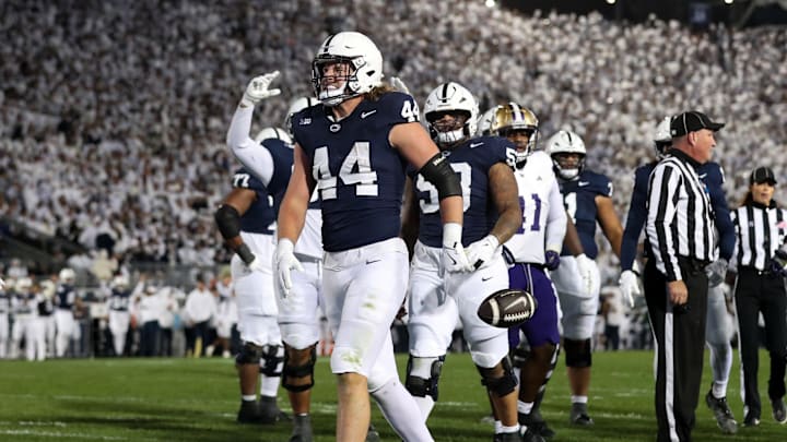 Nov 9, 2024; University Park, Pennsylvania, USA; Penn State Nittany Lions tight end Tyler Warren (44) reacts after scoring a touchdown against the Washington Huskies during the second quarter at Beaver Stadium. Mandatory Credit: Matthew O'Haren-Imagn Images