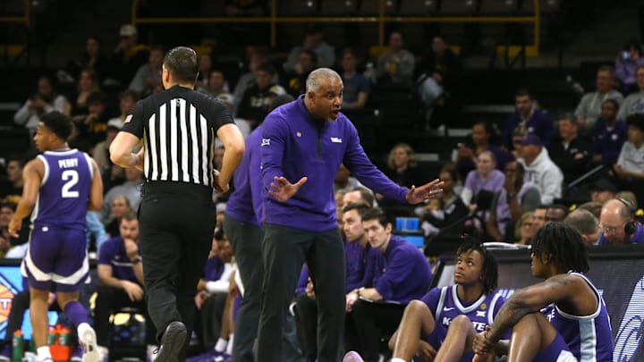 Kansas State  coach Jerome Tang talks to his team while playing Iowa in a first-round NIT game Tuesday, March 19, 2024 at Carver-Hawkeye Arena in Iowa City, Iowa.