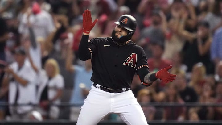 Arizona Diamondbacks third baseman Emmanuel Rivera (15) celebrates after hitting an RBI single