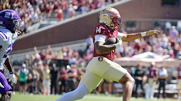 Sep 26, 2026; Tallahassee, Florida, USA;  Florida State Seminoles quarterback Ashton Daniels (14) runs during the first quarter against the Central Arkansas Bears at Doak S. Campbell Stadium.  Mandatory Credit: Melina Myers-Imagn Images