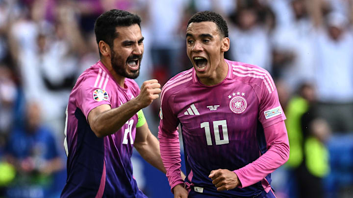 Jamal Musiala (right) celebrates with Ilkay Gundogan (left) after scoring against Hungary