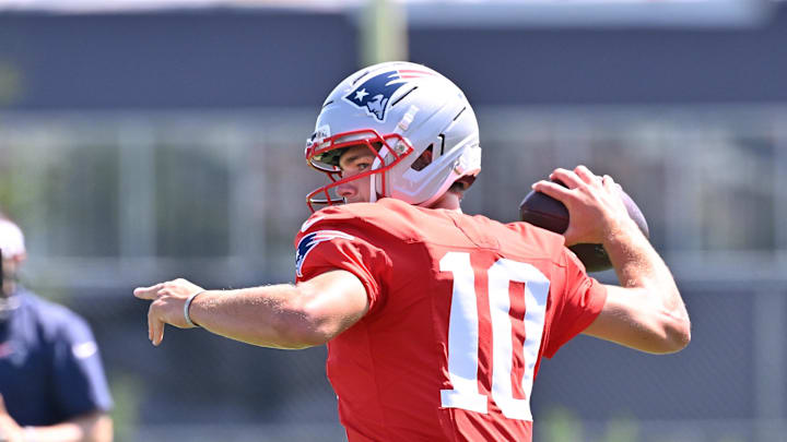 Jul 28, 2025; Foxborough, MA, USA; New England Patriots quarterback Drake Maye (10) throws a pass during training camp at Gillette Stadium. Mandatory Credit: Eric Canha-Imagn Images