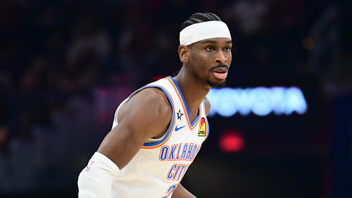 Jan 19, 2026; Cleveland, Ohio, USA; Oklahoma City Thunder guard Shai Gilgeous-Alexander (2) brings the ball up court during the first half against the Cleveland Cavaliers at Rocket Arena. Mandatory Credit: Ken Blaze-Imagn Images
