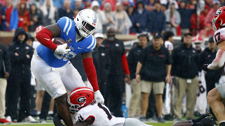 Nov 9, 2024; Oxford, Mississippi, USA; Mississippi Rebels defensive JJ Pegues (38) runs the ball as Georgia Bulldogs linebacker Jalon Walker (11) makes the tackle during the first half at Vaught-Hemingway Stadium. Mandatory Credit: Petre Thomas-Imagn Images Nov 9, 2024; Oxford, Mississippi, USA; Mississippi Rebels defensive JJ Pegues (38) runs the ball as Georgia Bulldogs linebacker Jalon Walker (11) makes the tackle during the first half at Vaught-Hemingway Stadium. Mandatory Credit: Petre Thomas-Imagn Images
