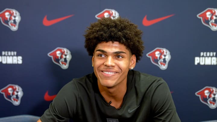 Basketball player Koa Peat takes questions from the media during National Signing Day at Perry High School in Gilbert, Arizona on April 16, 2025.