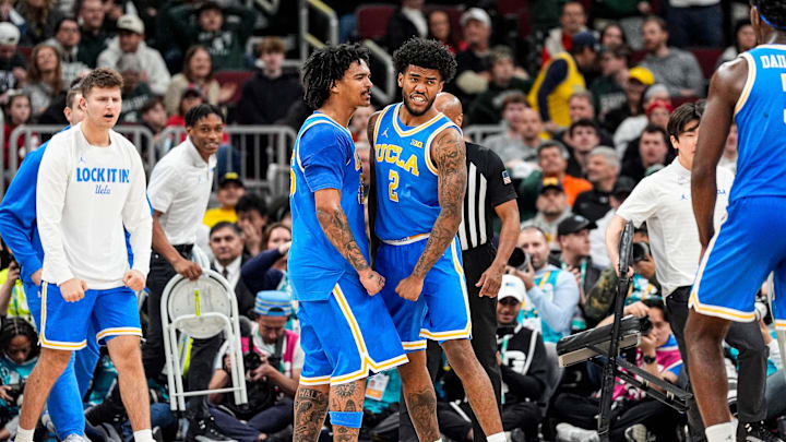 UCLA guard Donovan Dent (2) celebrates a play against Michigan State during the second half of Big Ten tournament quarterfinal at United Center in Chicago on Friday, March 13, 2026.