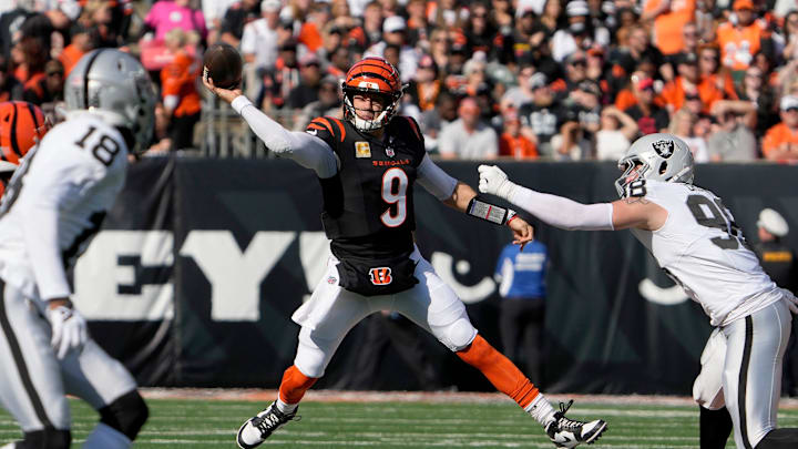 Cincinnati Bengals quarterback Joe Burrow (9) makes in the 1st quarter over Las Vegas Raiders at Paycor Stadium Sunday, November 3, 2024. Cincinnati Bengals quarterback Joe Burrow (9) makes in the 1st quarter over Las Vegas Raiders at Paycor Stadium Sunday, November 3, 2024.